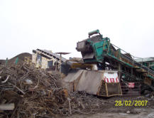 Scrap metal pile from crushing operation.