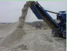 New aggregate coming off the belt - blue crusher.